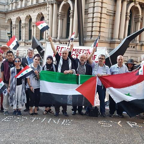 Several members of the Al-Tajamu network at a 2017 demonstration in Sydney, including Jay Tharappel, Hanadi Assoud, Hussein Dirani and Tim Anderson. (Source: Hanadi Assoud’s Facebook feed)