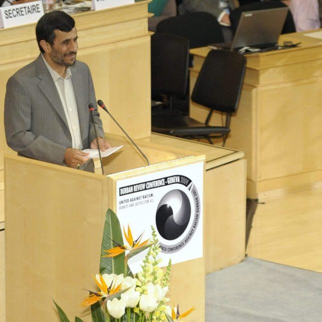 Then-Iranian President Mahmoud Ahmadinejad during the opening of the Durban Review Conference (UN's Conference against Racism) at the European headquarters of the United Nations in Geneva, 2009. (Credit: AP Photo/Laurent Gillieron)
