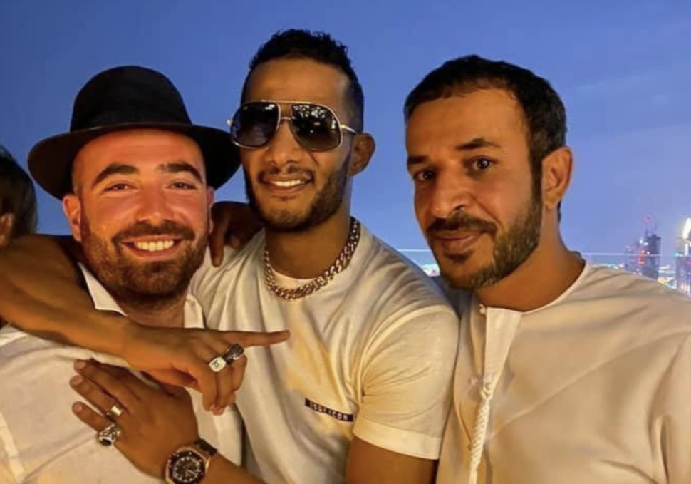 L-R: Israeli singer Omer Adam, Egyptian actor Mohamed Ramadan and Israeli footballer Dia Saba on a Dubai rooftop