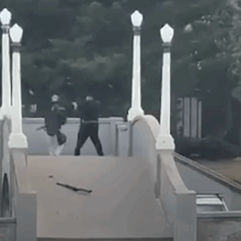 Bondi terrorists Sajid and Naveed Akram open fire at Jews attending Chanukah by the Sea 2025 (Image: Screenshot)