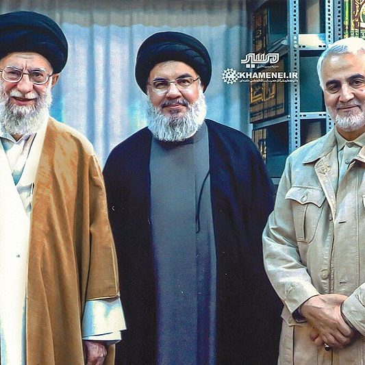 Iran's Supreme Leader Ali Khamenei (left), Hezbollah Secretary-General Hassan Nasrallah and the late commander of the IRGC's Qods Force Qassem Soleimani
