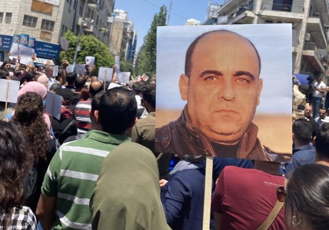 Protesters in Ramallah with pictures of Nasir Banat, who was killed in police custody on June 24 (Photo: Amnesty International)