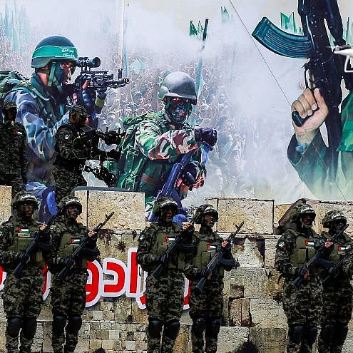 Palestinian members of the Al-Qassam Brigades, the armed wing of Hamas, at a rally in Gaza City celebrating the 31st anniversary of Hamas on Dec. 16, 2018. Credit: Abed Rahim Khatib/Flash90.