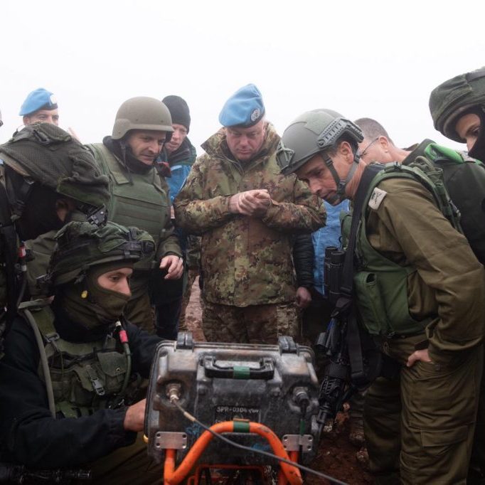 Israeli soldiers show UNIFIL commander Maj. Gen. Stefano Del Col (centre) a Hezbollah tunnel that penetrated Israeli territory from southern Lebanon on December 6, 2018.