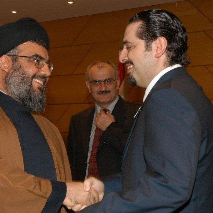 Hezbollah head Hassan Nasrallah with Lebanese PM Saad Hariri: The former has much more reason to smile