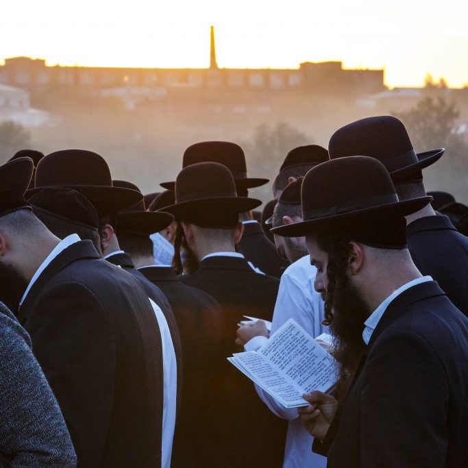 Ultra-Orthodox Jews praying in Uman, Ukraine (Credit: Shutterstock)