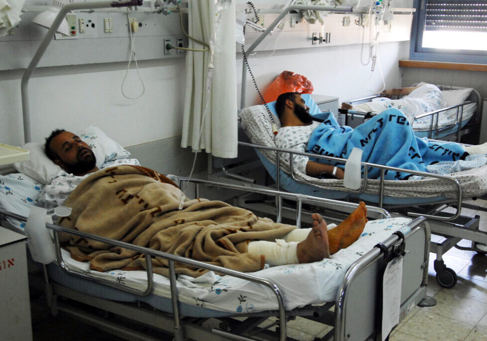 Palestinian men rest in Israel's Barzilai Hospital (Image: Shutterstock)