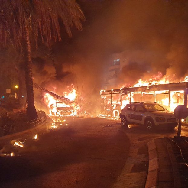 The immediate aftermath of a Palestinian rocket hitting a passenger bus in Holon, Israel, on May 11, 2021. (Credit: Roman Yanushevsky/Shutterstock)