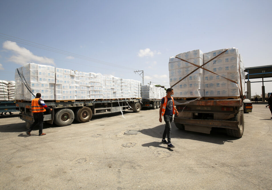 Aid trucks crossing into Gaza (Image: Shutterstock/ Anas Mohammed)