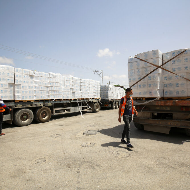 Trucks,Loaded,With,Humanitarian,Aid,,Passes,Into,Rafah,In,The Aid trucks crossing into Gaza (Image: Shutterstock/ Anas Mohammed)