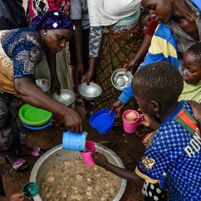 A,Woman,Serving,Nutritional,Food,To,The,People,Who,Attend Image: Shutterstock