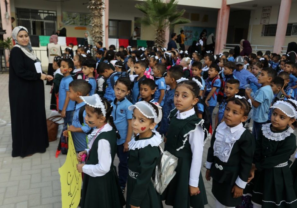 Palestinian students line up for class in Gaza (Image: Shutterstock)