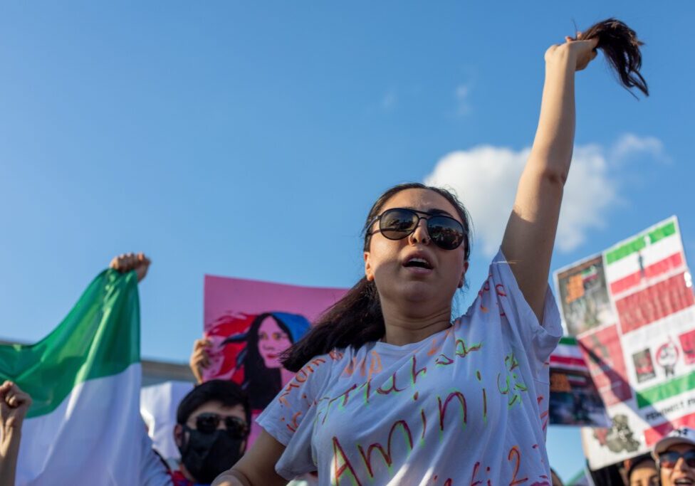 A protest in response to the death in detention of Mahsa Amini by Iran's morality police in Tehran (Image: Tolga Ildun/ Shutterstock)