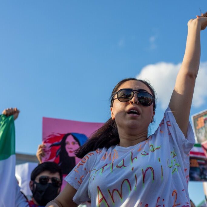 A protest in response to the death in detention of Mahsa Amini by Iran's morality police in Tehran (Image: Tolga Ildun/ Shutterstock)