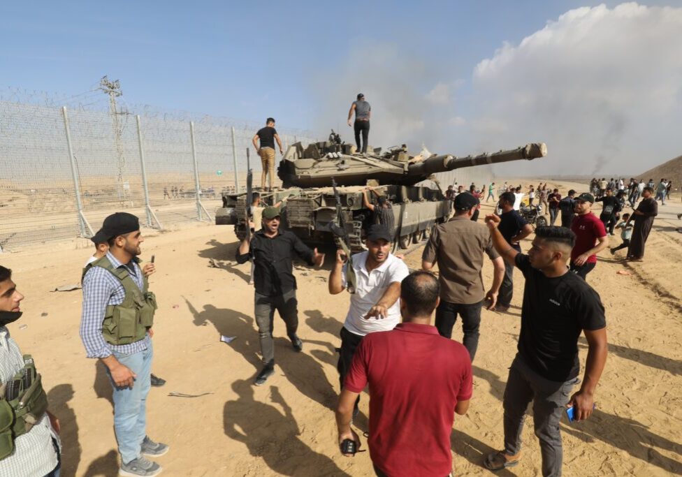 The Fiasco: Gazans capture an Israeli tank on October 7 (Image: Anas Mohammed/ Shutterstock