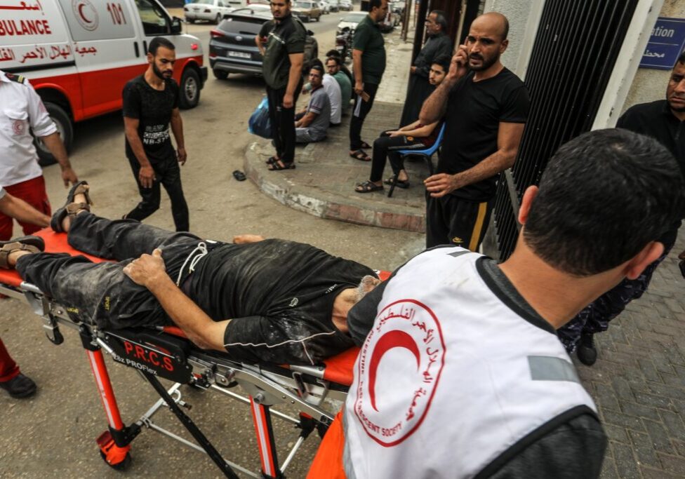 A wounded Palestinian arrives at Al-Najjar Hospital in the Gaza Strip (Image: Anas Mohammed/ Shutterstock)