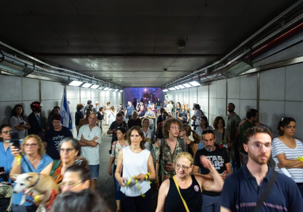 Israeli civilians rushing into public shelters as the sirens go off during the ongoing Hamas-Israel war (Image: Shutterstock)