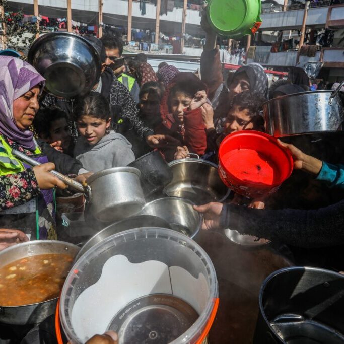 Palestinian charitable organisations distribute food “takiya” to displaced people in the city of Rafah (Image: Shutterstock)