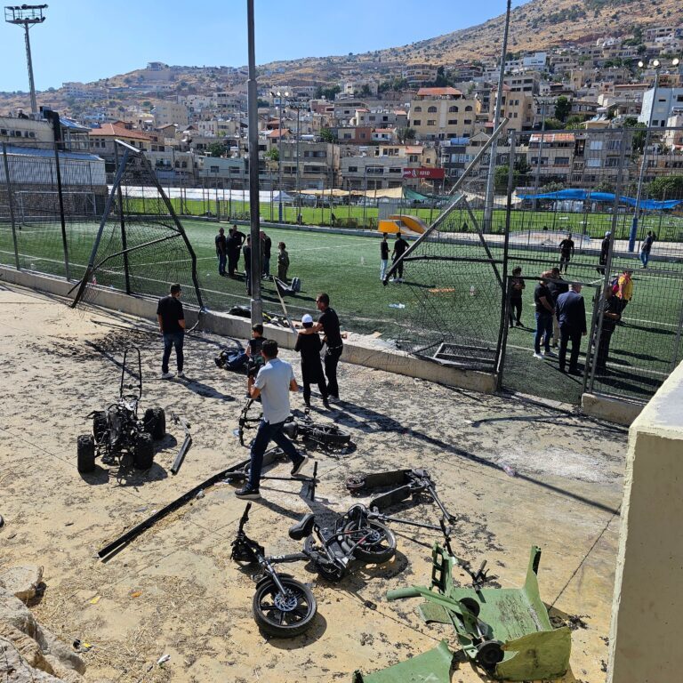 Aftermath of Hezbollah rocket fire attack on a school playground in a druze town of Majdal Shams, 29 July 2024 (Image: Roman Yanushevsky/ Shutterstock)