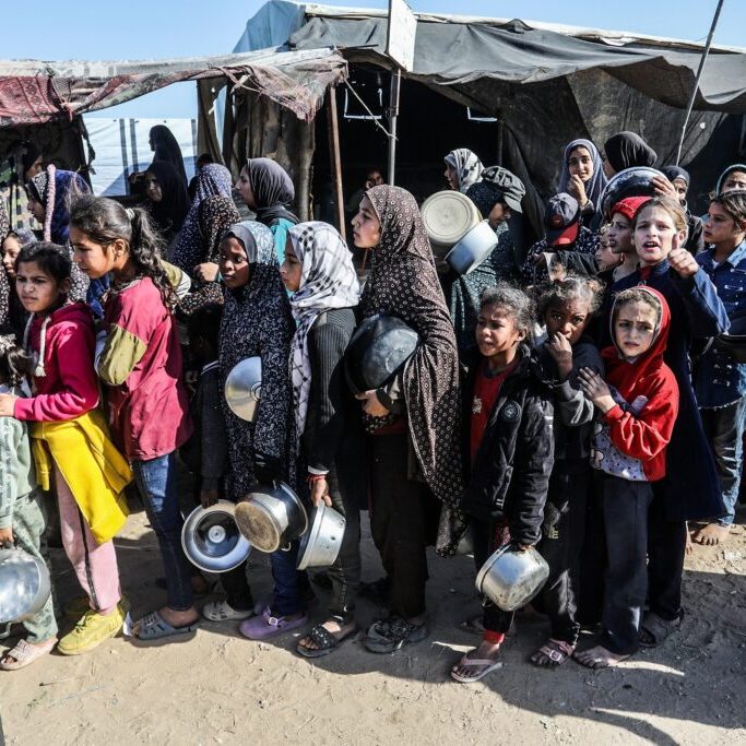 Displaced,Palestinians,Crowd,To,Get,Lentil,Meals,From,(al Takiya),Due Image: Anas Mohammed/ Shutterstock