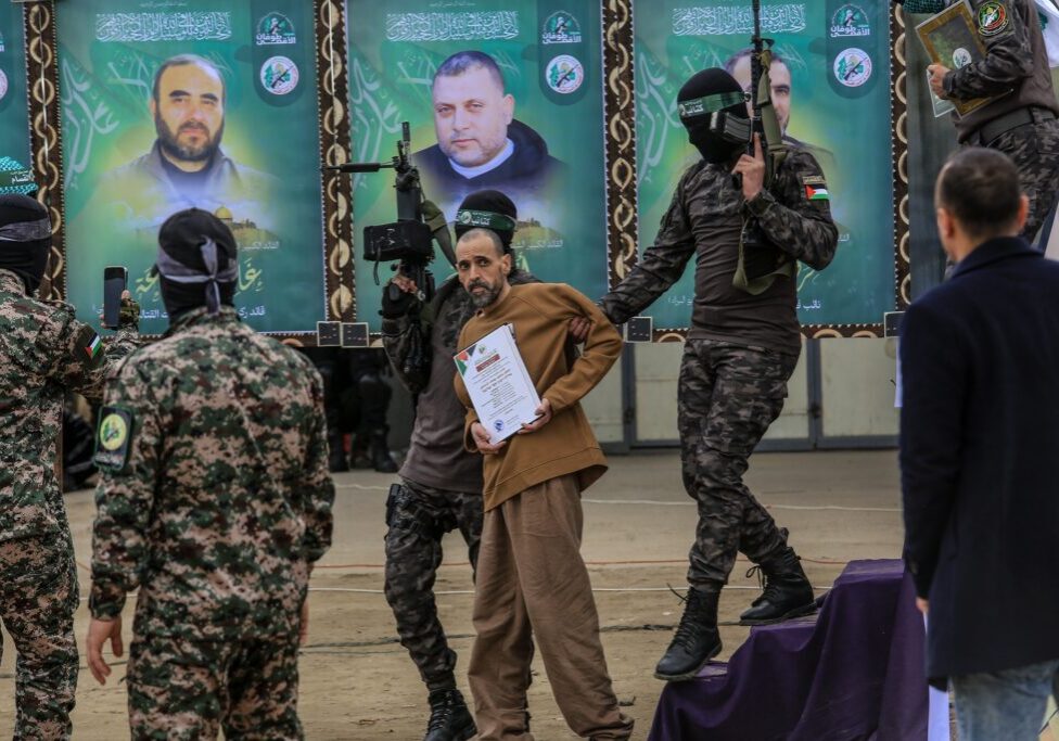 Israeli hostage Eli Sharabi during his handover by Al-Qassam Brigades to the Red Cross, in Deir al-Balah, central Gaza Strip, on February 8, 2025 (Image: Anas Mohammed/ Shutterstock)