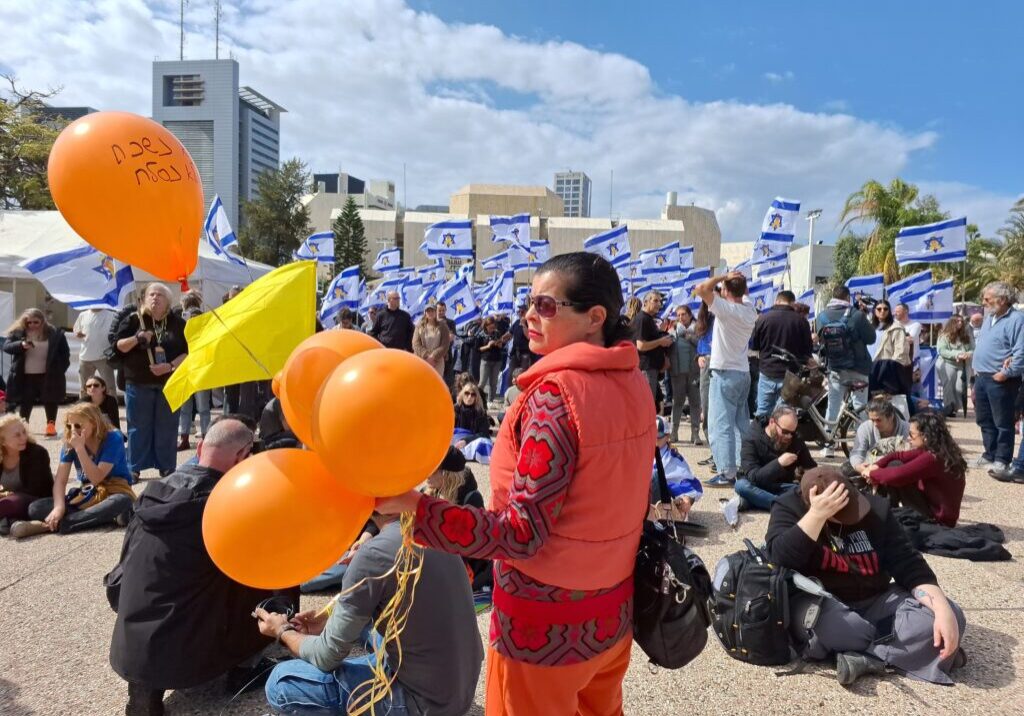 Israeli flags in Hostages and Missing Square, Tel Aviv, marking a mourning day dedicated to the first return of casualties from Gaza (Image: Shutterstock)