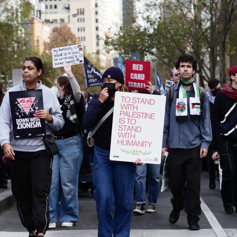 Protesters in Melbourne (Image: Marius Amerio-Cox/ Shutterstock)