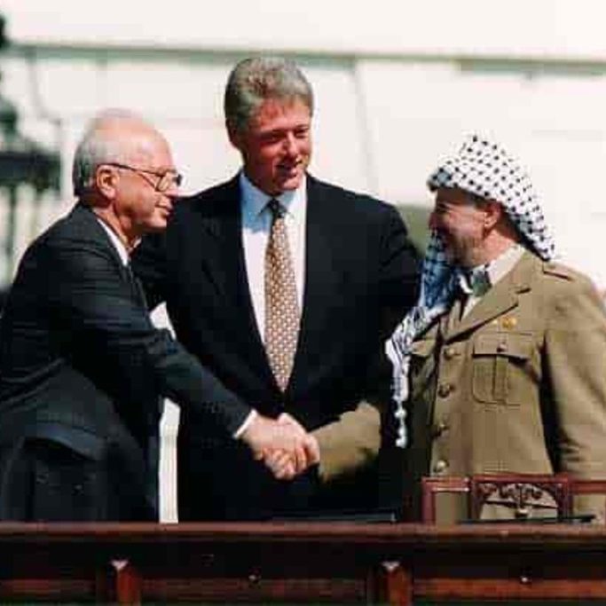 Oslo Accords signing ceremony in 1993 with then Prime Minister Yitzhak Rabin (left), then US President Bill Clinton and former PLO leader Yasser Arafat