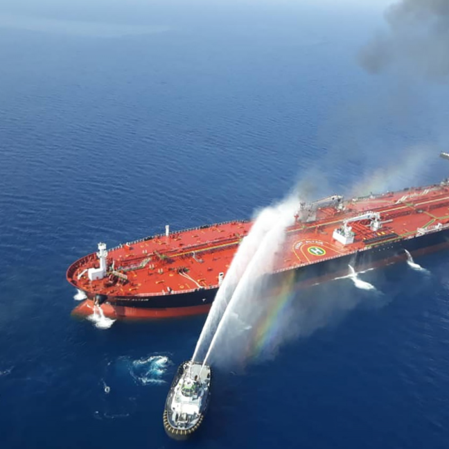 An attacked oil tanker near the Persian Gulf has sparked debate in the media about Iran policy