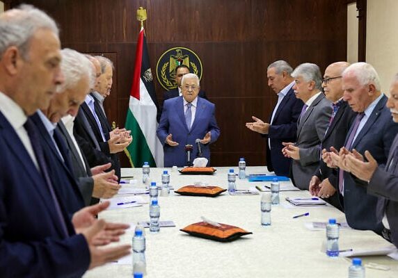 Palestinian Authority President Mahmoud Abbas (C) recites a prayer during a meeting with members of the executive committee of the Palestine Liberation Organisation (PLO) in the West Bank city of Ramallah (Image: WFA/ X)